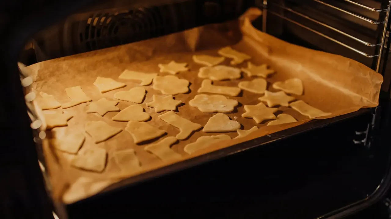 A tray of freshly baked cookies in a kitchen