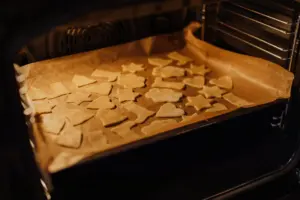 A tray of freshly baked cookies in a kitchen